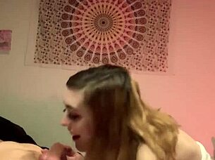 A femdom delivers an evil blowjob to a monster cock.