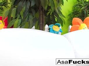 Asa Akira receives a huge jizz load on her ass after blowjob.