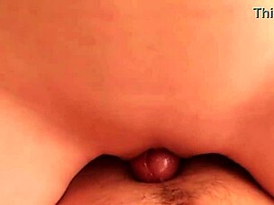 a young woman gently massages with her lips in an amateur setting