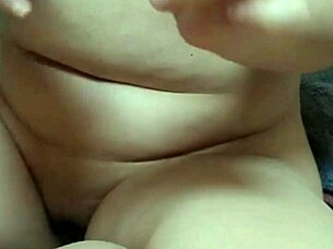 Asian soloist wets pussy with toys