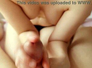 she gives an intense handjob while showing her nice tits, leading to a big cumshot.