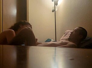 Amateur couple engages in blowjob and riding