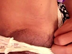 Vietnamese girl shows her pussy late at night in a secretive display.