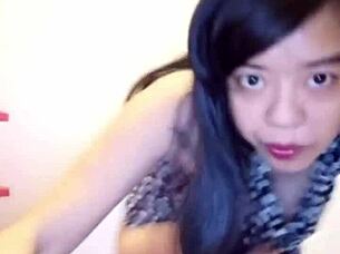 Vietnamese girl shows her pussy late at night in a secretive display.