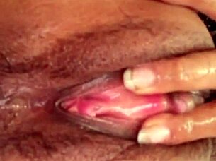 Vietnamese girl shows her pussy late at night in a secretive display.