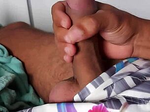 A guy jerks off his big monster cock