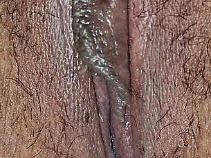 Up close view of wet pussy during intense fucking scene