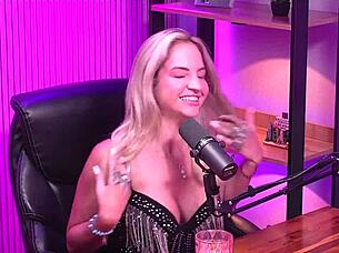 Blonde girl orgasms in lesbian lingerie session.