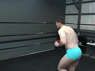 Erotic gay fight 2 with domination and intense wrestling moves on the mat.