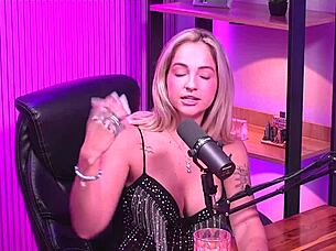 Blonde girl orgasms in lesbian lingerie session.