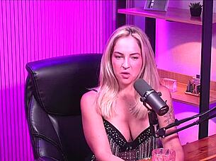 Blonde girl orgasms in lesbian lingerie session.