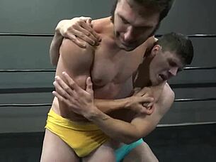 Erotic gay fight 2 with domination and intense wrestling moves on the mat.