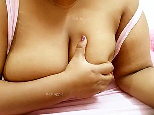 Look at that asian sexy aunty's big boobs.