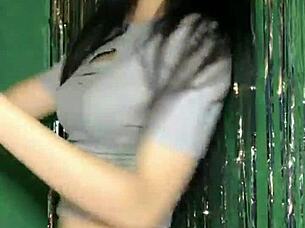 Korean Asian girl performs sexy dance on Uplive livestream webcam show.