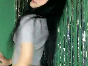 Korean Asian girl performs sexy dance on Uplive livestream webcam show.