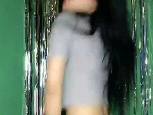 Korean Asian girl performs sexy dance on Uplive livestream webcam show.