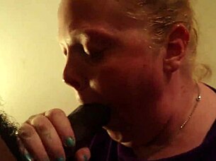 Chubby redhead enjoys session with big black cock