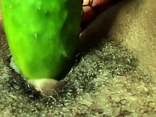Ebony cyndy fucks cucumber in pussy with close-up squirt 😏