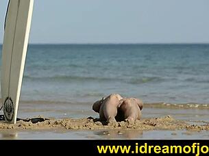 surfs up, brunette surfer enjoys solo time on beach