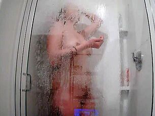 Raven Grey Showers With Shaved Pussy In Intense Voyeur Scene