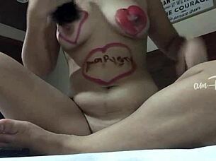 amateur girl paints her naked asian body with lipsticks