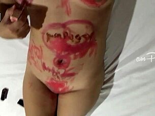 amateur girl paints her naked asian body with lipsticks
