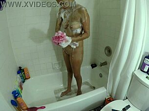 angel lover bathes intensely in shower
