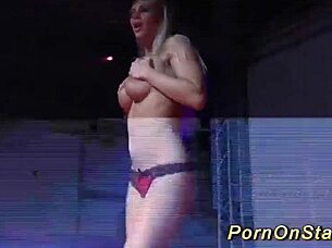 hot babe does striptease on stage