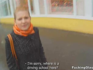 Christina teen in glasses has fun with persimmon