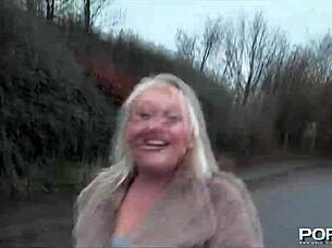 Is this mature blonde babe flashing her tits and pissing on the street in public?