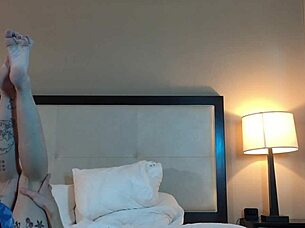 Young man muff diving into hot petite teen's shaved pussy with tattoos and licking hairless area