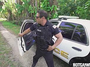 cop gets a surprise when asked to pull over. muscular bodybuilder in uniform at the office.
