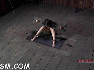 Cute brunette babe masturbates with toys in hardcore BDSM session