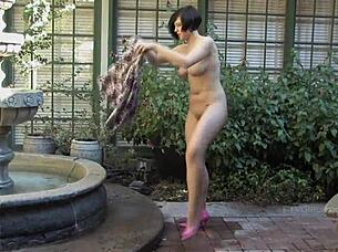 Sexy Brunette Gets Caught Naked In Public During Risky Interview