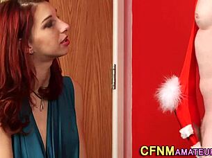 Redhead babe in CFNM sucks and tugs while wearing shoes and staying clothed.