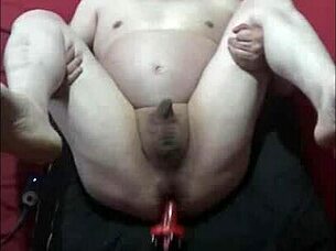 bisexual male takes dildo machine anal