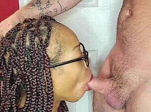 Ebony couple in intimate sucking scene