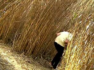 adventurous minx plays with hard cock outdoors