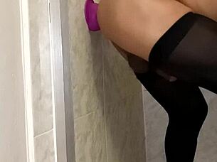 Having sex with my dildo in the bathroom