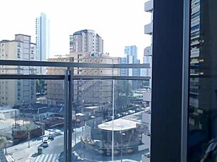 Hot gamer girl clothed flashing tits on balcony outdoor