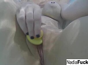 Nadia Strips Naked, Rubs Pussy With Rubber Toys