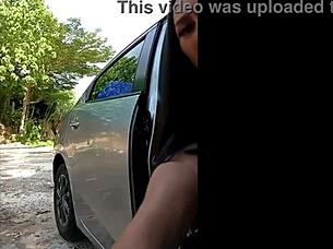 Thai Ladyboy Strokes Massive Cock Publicly in Car