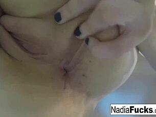 sexy nadia bathes with rubber duckies in solo fun