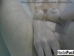 sexy nadia bathes with rubber duckies in solo fun
