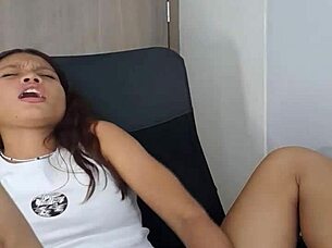 Eighteen-year-old woman plays with pussy using dildo