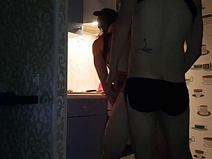 asmodey and jasper cook dinner in the kitchen