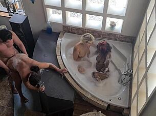 Three Girls Dominate Guy In Spa Bath Orgy