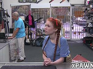 Hey, check out this redhead teen fucking for cash in the pawnshop