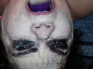 Ms TL takes dildo deep in throat.