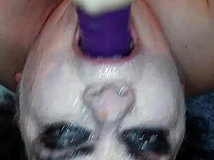 Ms TL takes dildo deep in throat.